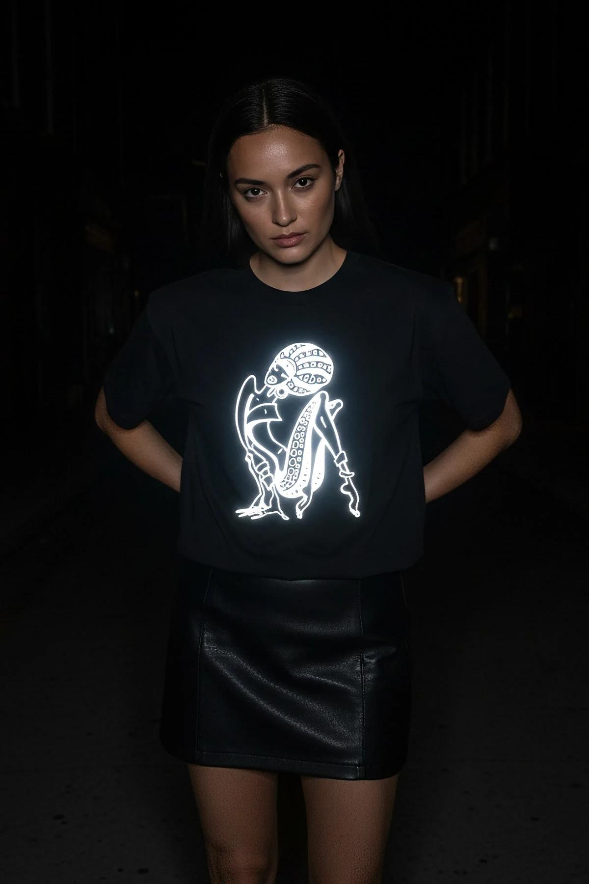 black personalized reflective tee flat lay showing 180gsm fabric texture and chest print placement
