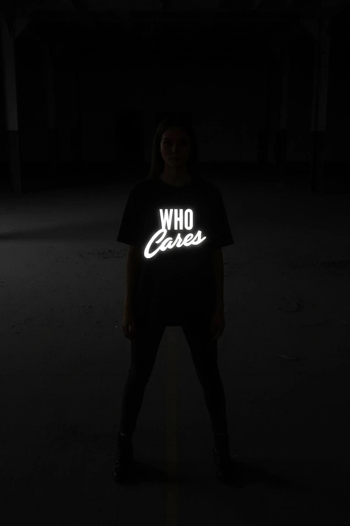 custom reflective graphic tee black oversized back view with bold white name and number lightning bolt print