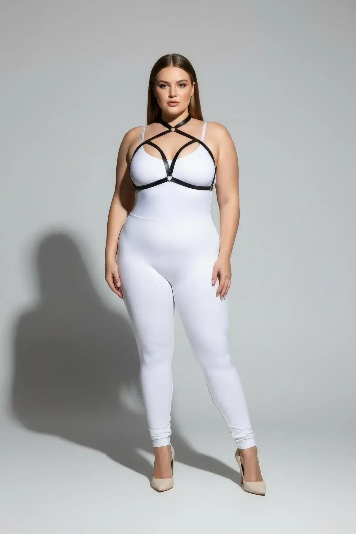black caged chest harness over sheer top festival outfit styling
