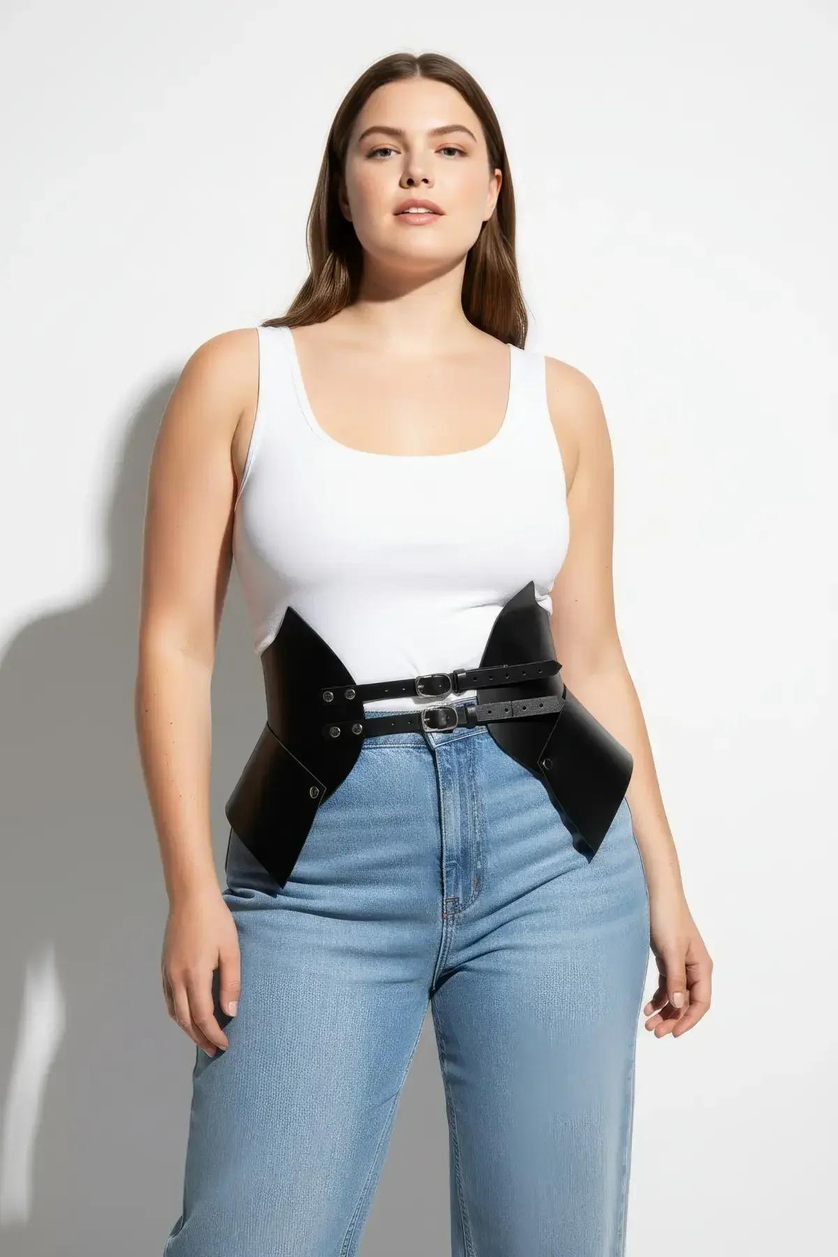 close-up of silver-tone zinc alloy double buckle closure and stud row on black waist cinch harness