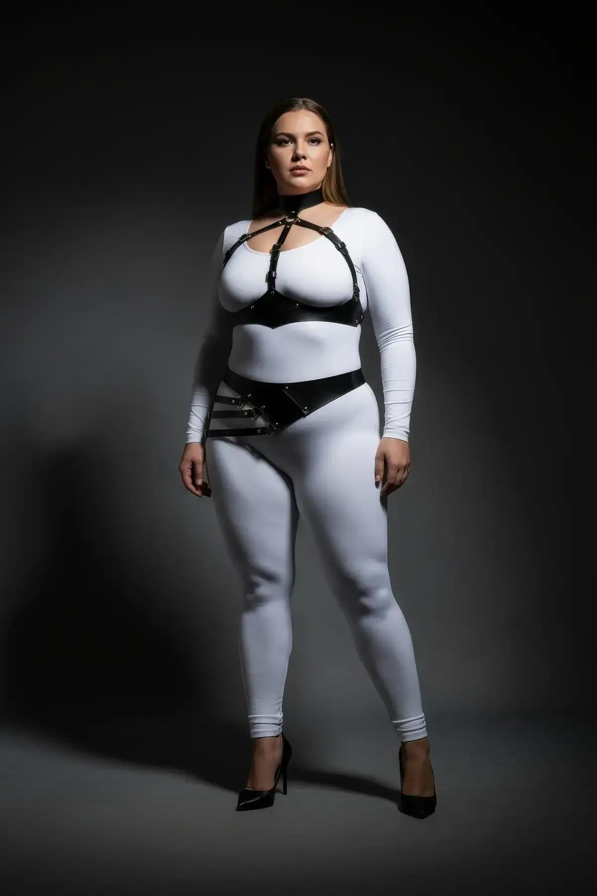 black body harness over white bodysuit full length view showing two-zone strap construction