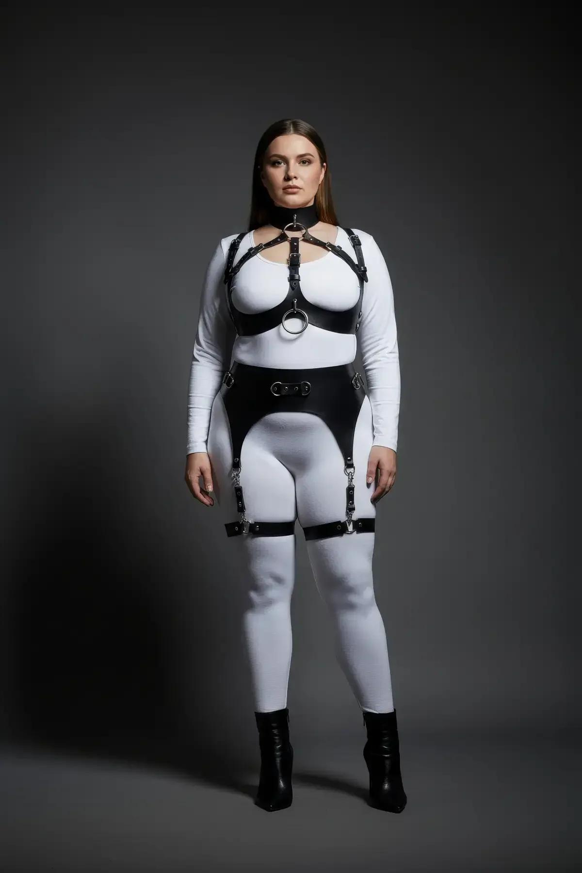 wide black faux leather hip belt with four garter suspender clips attached to thigh bands close-up