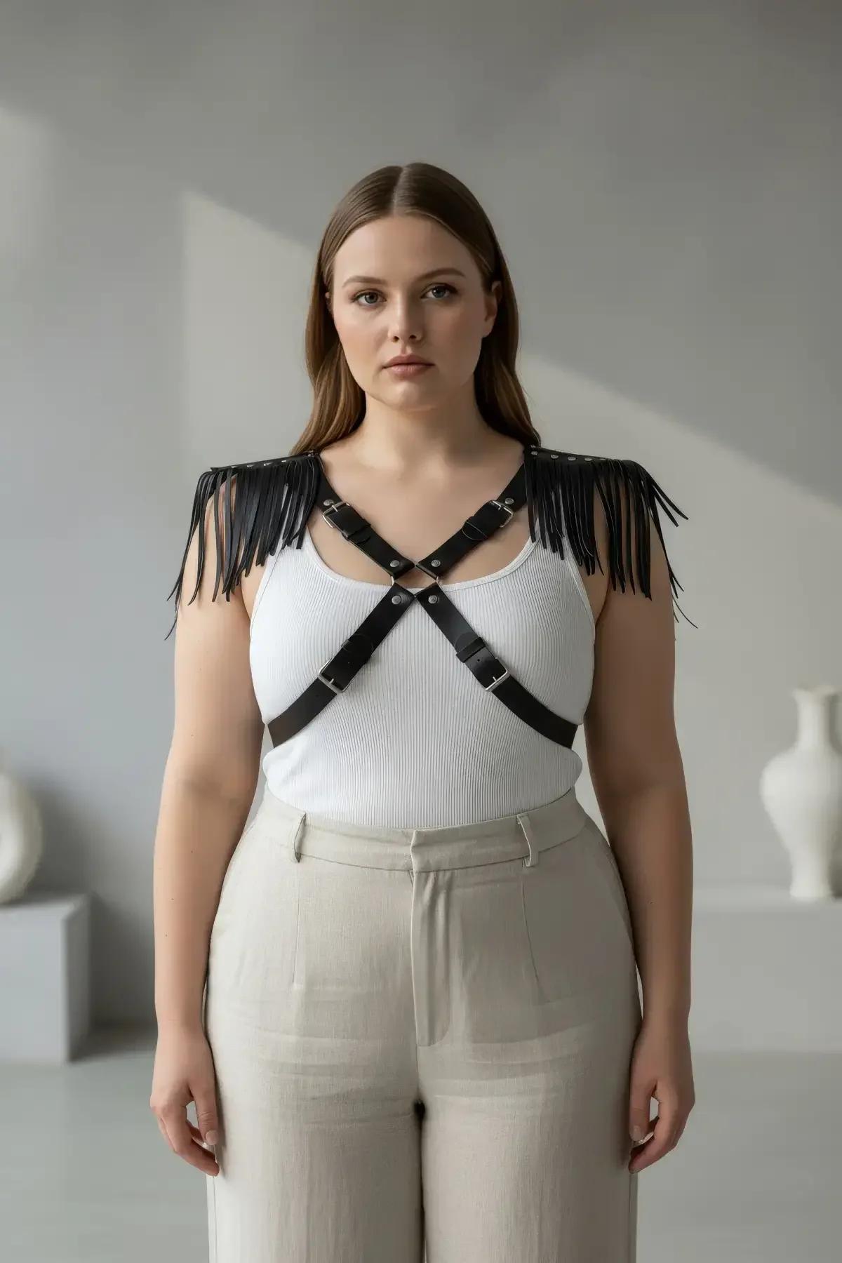 back view of black fringed chest harness showing adjustable strap configuration and fringe drape