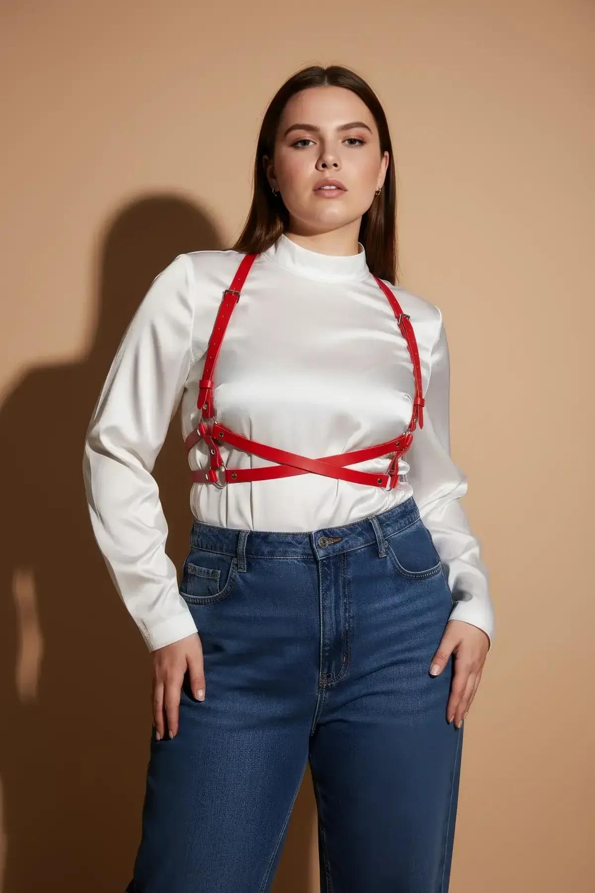 close-up of red PU leather harness straps with gold zinc alloy O-rings and buckle closure