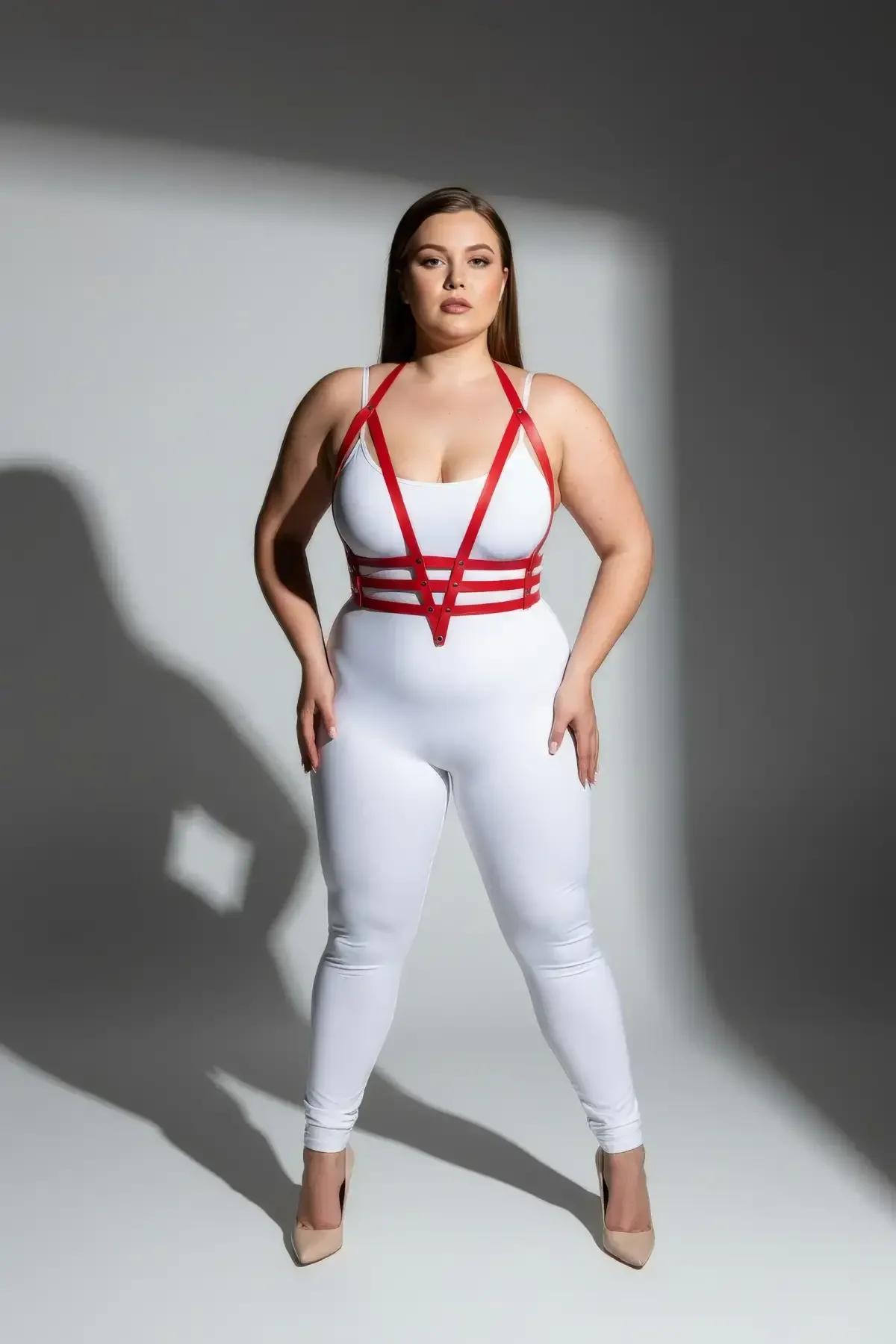 close-up of red faux leather horizontal chest bands with silver-tone connector hardware