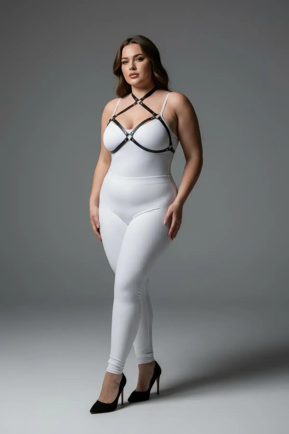 Strappy black o-ring harness bra front view showing adjustable four-band chest layout