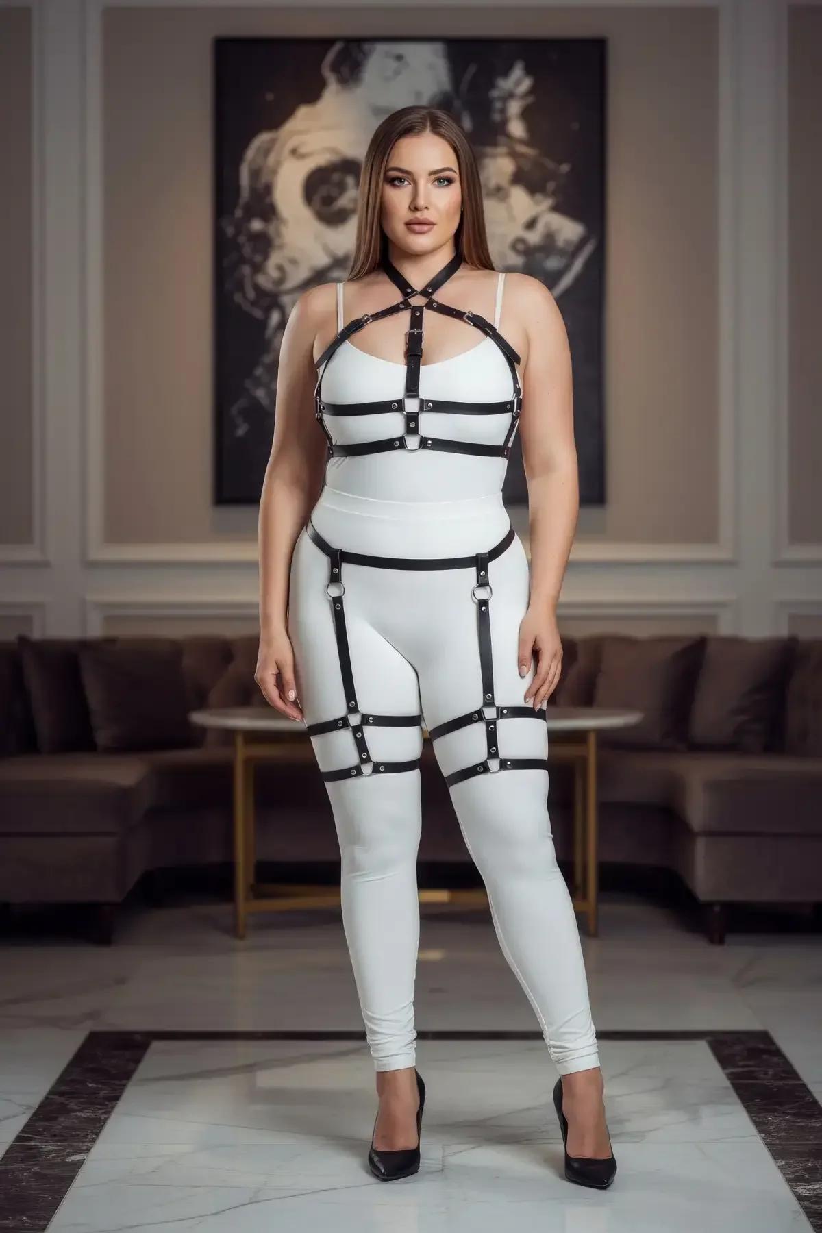 Adjustable waist band and garter strap O-ring connections on black vegan leather harness