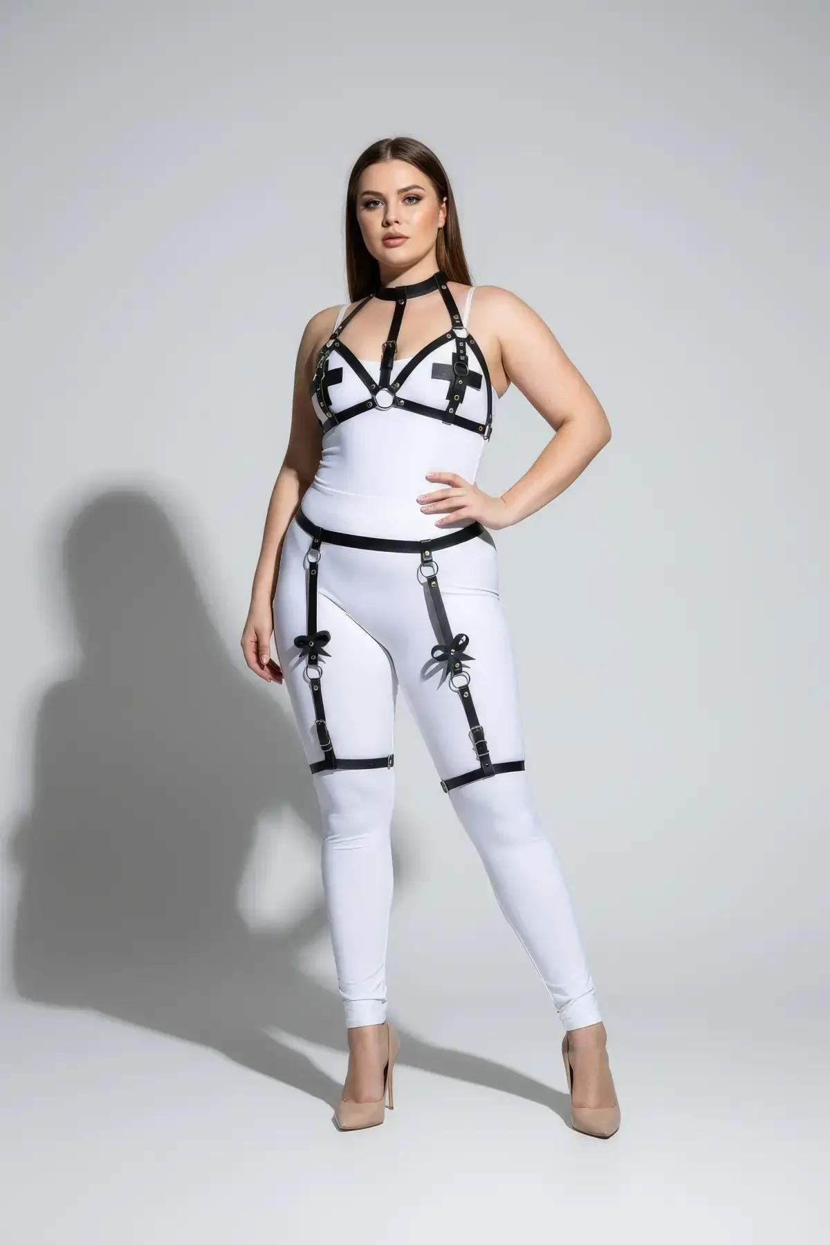 garter straps with bow-knot detail and silver O-ring clips at thigh level black harness