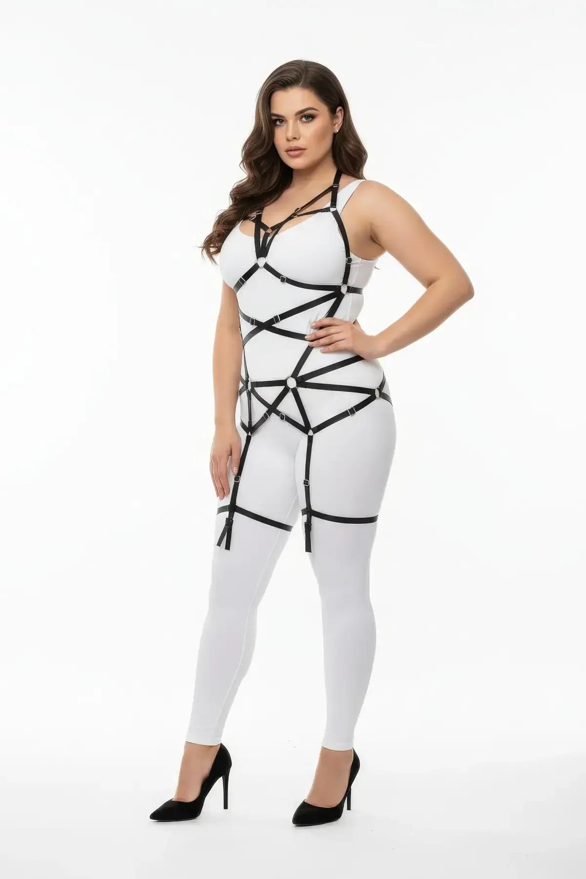 black faux leather full body harness with five silver O-ring connectors at chest and waist detail view