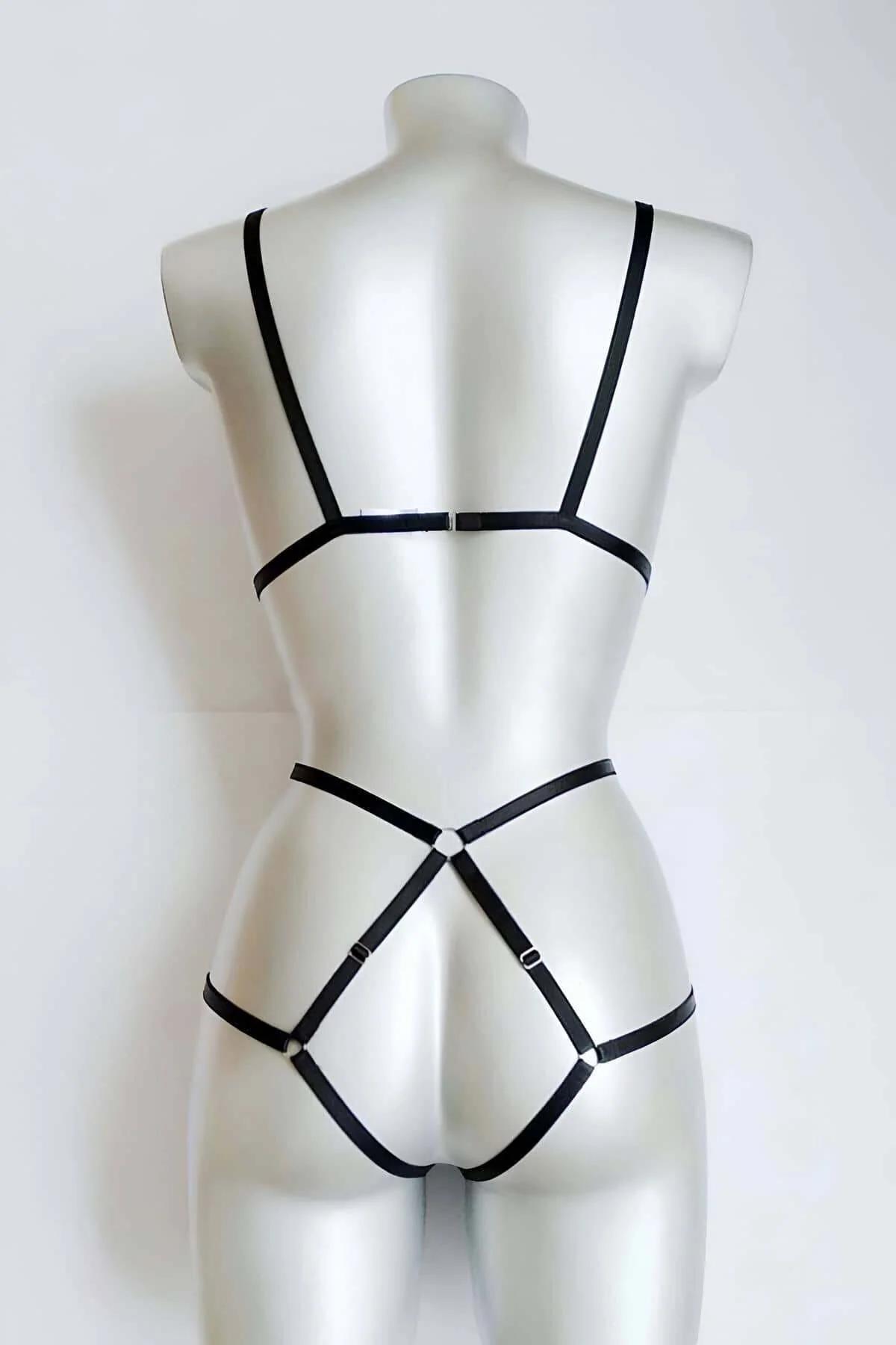 black nylon elastic harness chest V-frame cage detail with chrome O-ring connectors