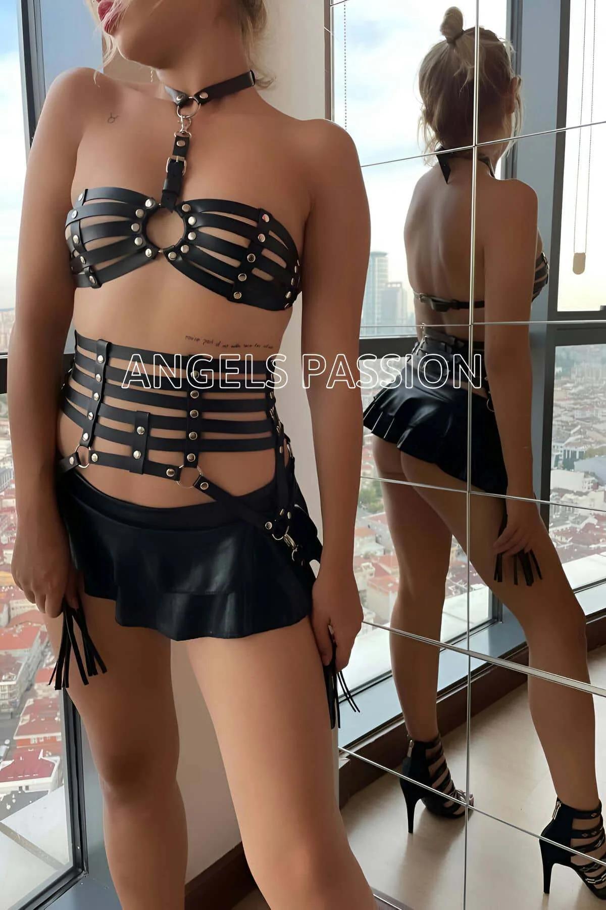 black faux leather 5-strap waist belt with silver studs and side O-rings close-up