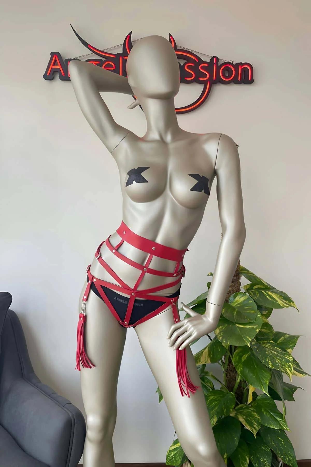 close-up red cage harness silver stud closures adjustable waist strap 1.5 cm width