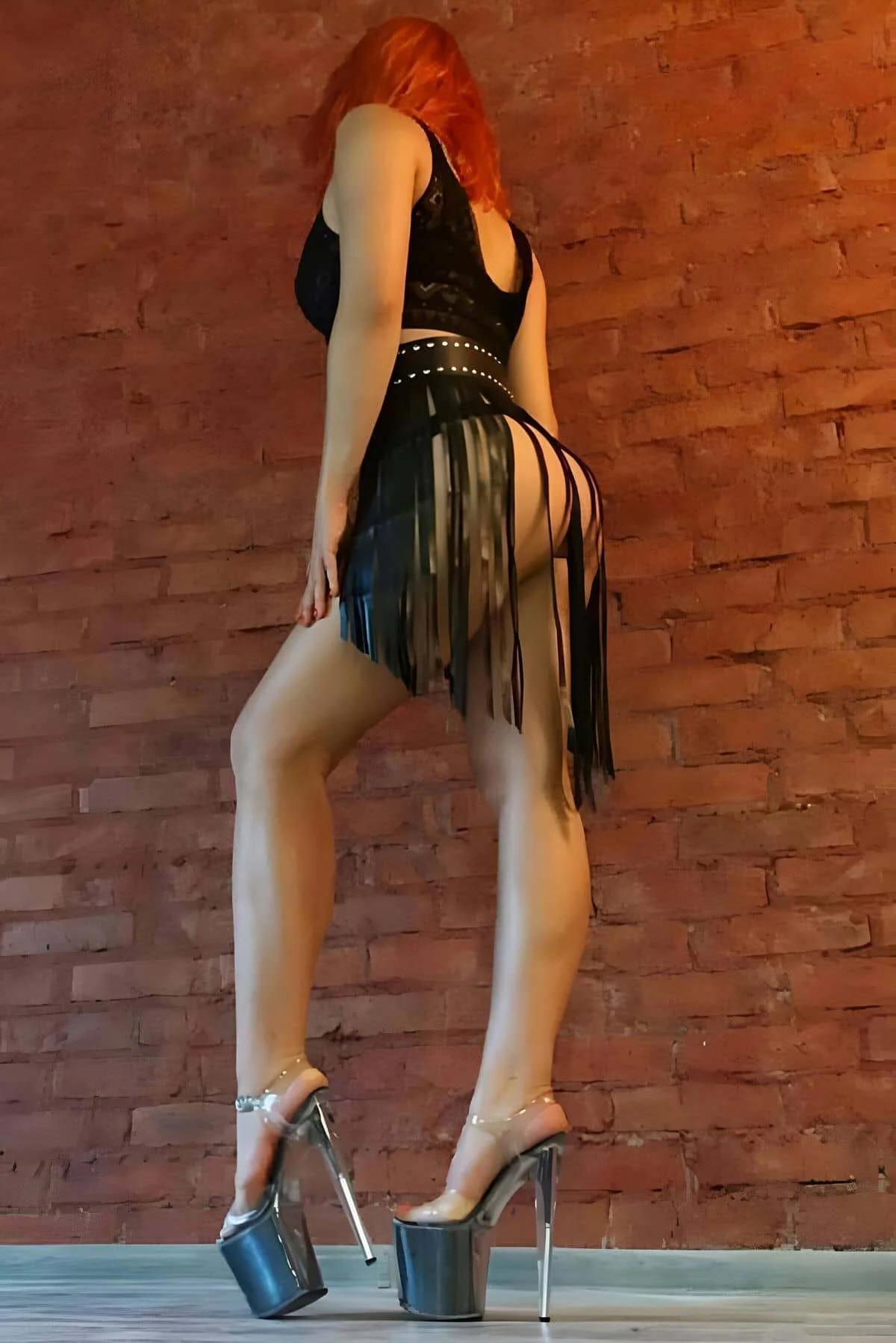 black PU leather fringe skirt front view silver stud belt waistband detail