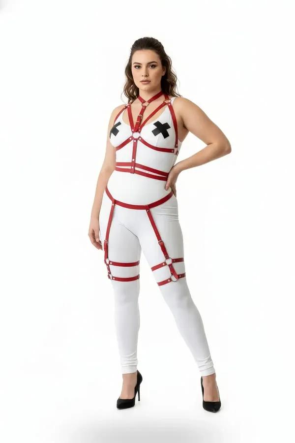 red faux leather strappy body harness set with garter thigh straps and gold O-ring buckles, worn by plus-size model