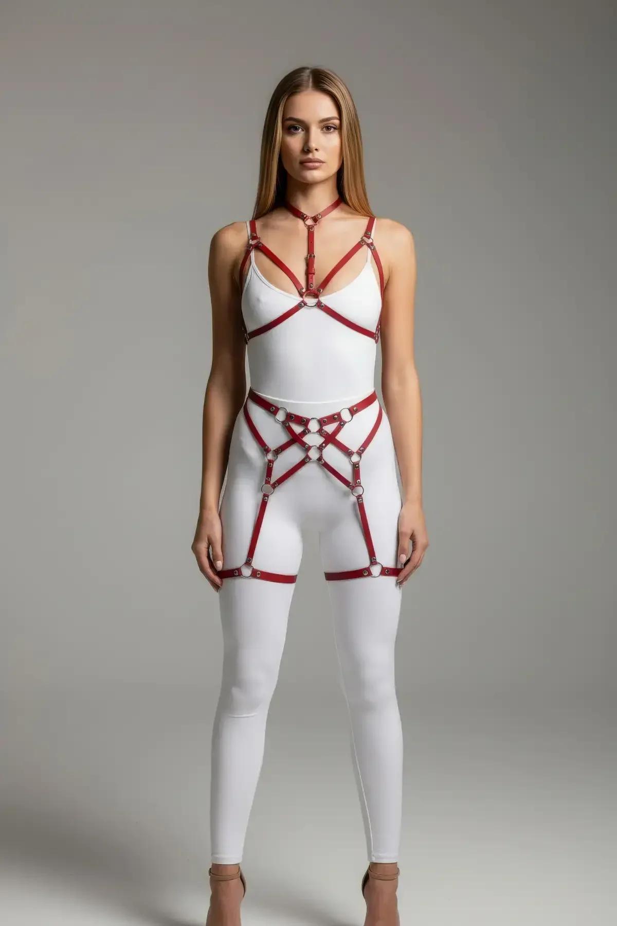 multi-strap red body harness waist and hip section with silver o-ring connectors