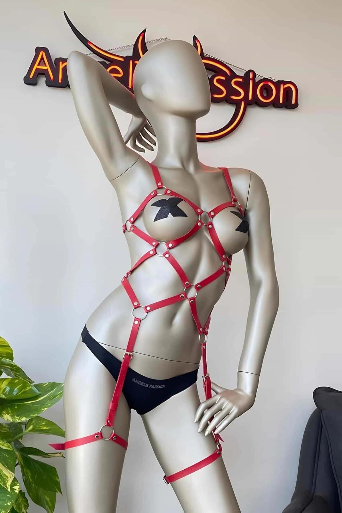 full body red harness waist and hip strap detail silver hardware close-up