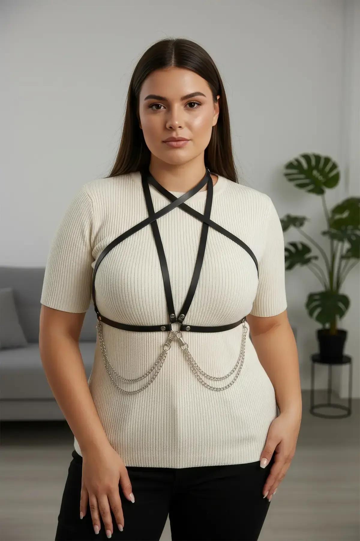 silver zinc alloy draping chains attached to waistband of black star chest harness