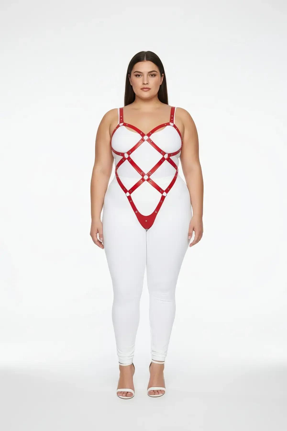front view of red diamond-grid body harness with silver O-rings over white bodysuit