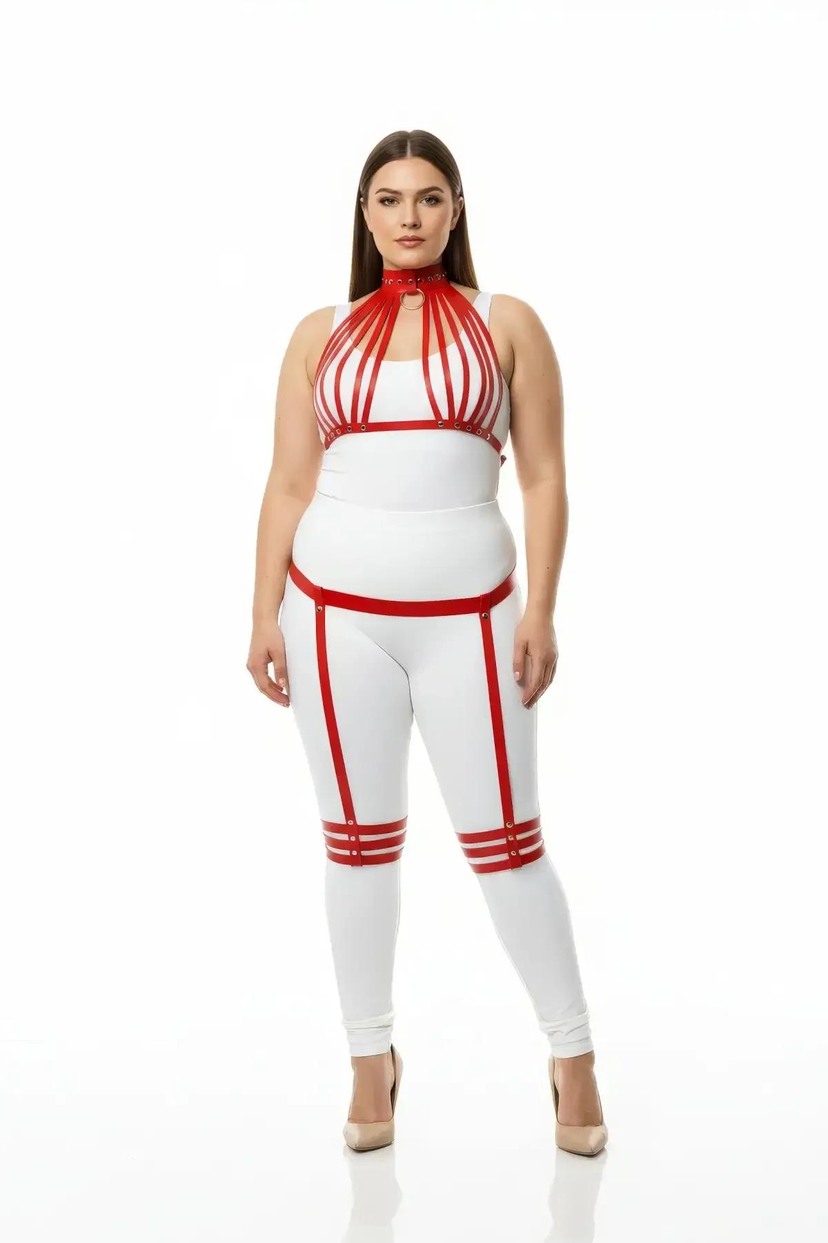 red faux leather cage harness chest piece close-up showing vertical straps and gold stud hardware