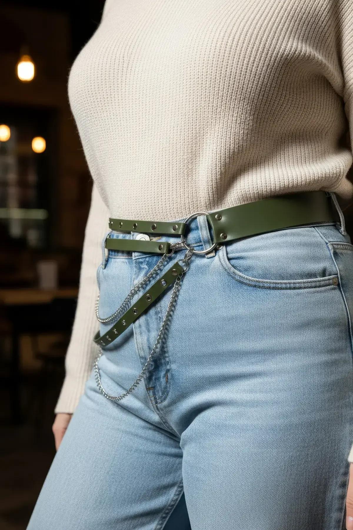 adjustable buckle closure detail on khaki faux leather waist harness with chain accent