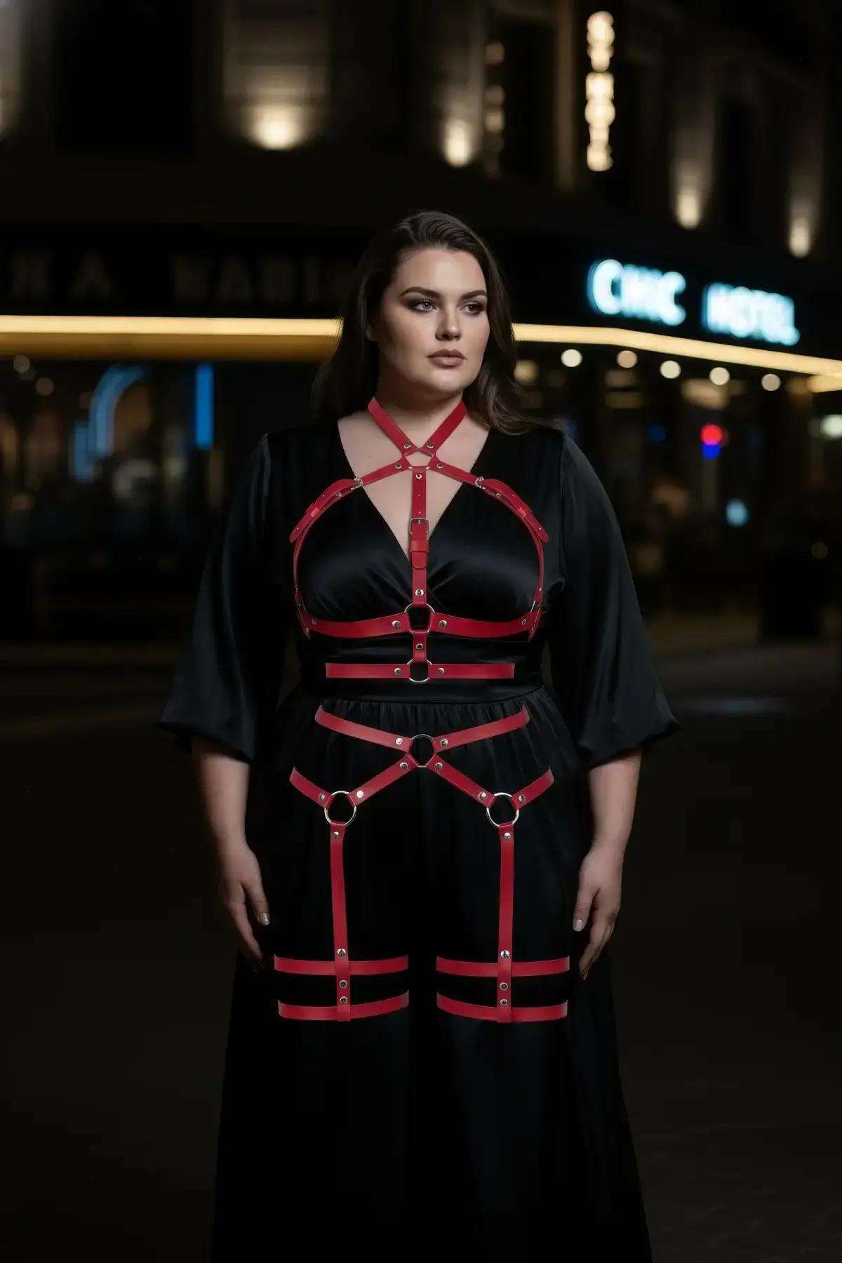 full body red strappy harness over white base layer showing complete strap layout front view