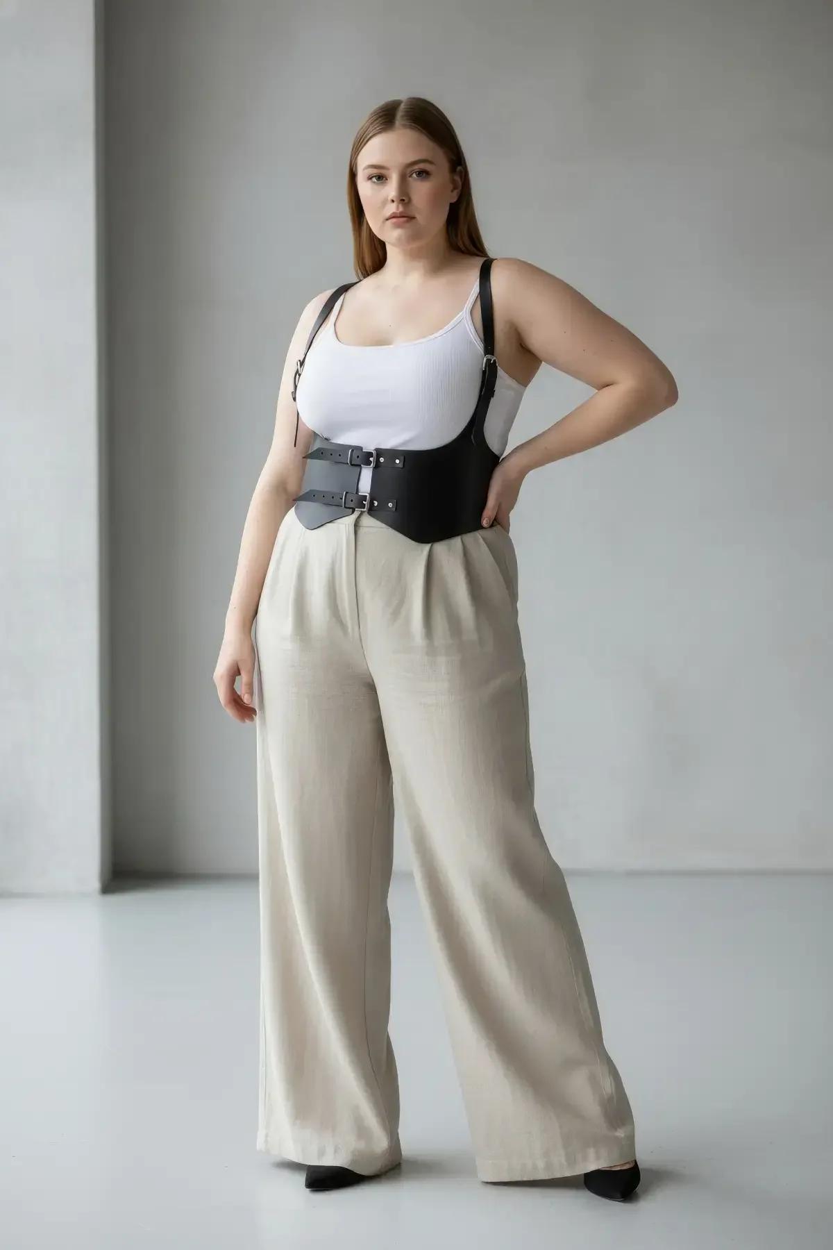 front view of black matte faux leather waist cincher with center silver-tone buckle closure