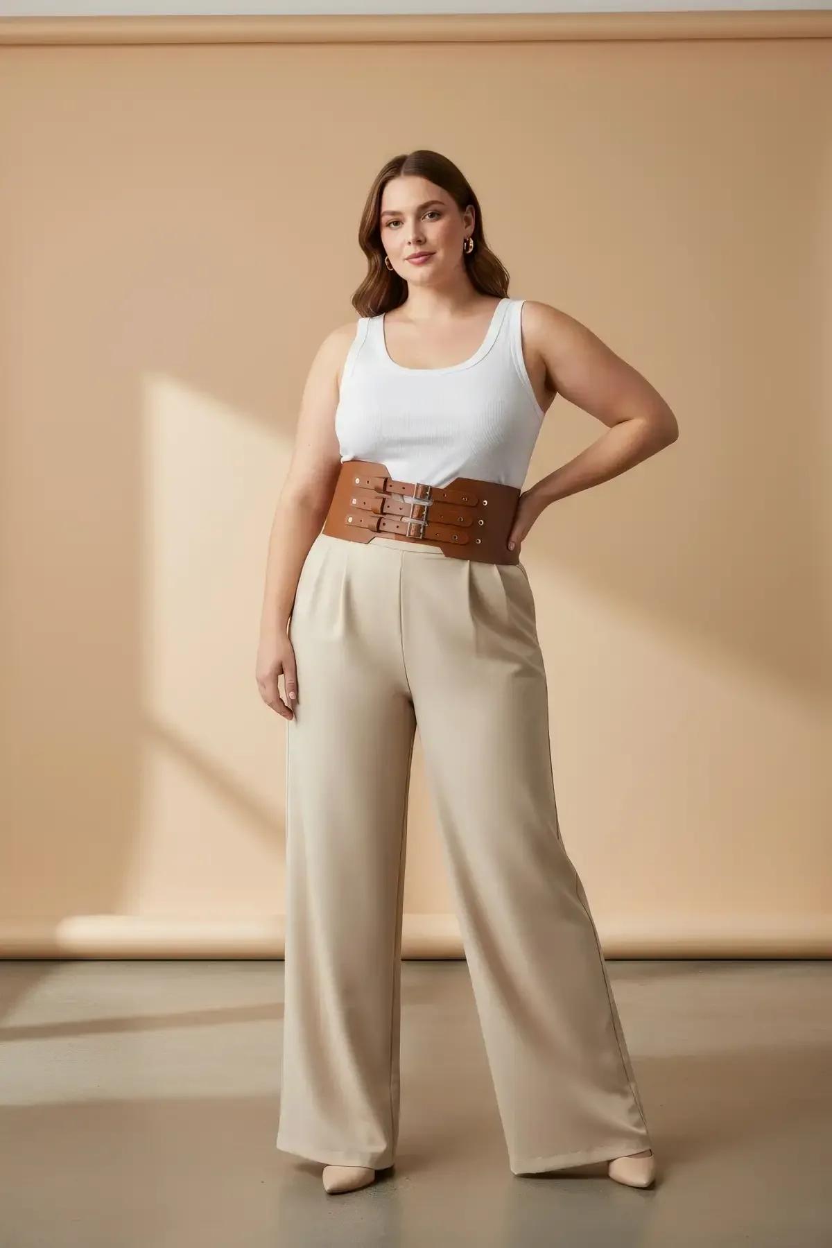 wide tan vegan faux leather waist harness showing three adjustable buckle rows and punched eyelets close-up