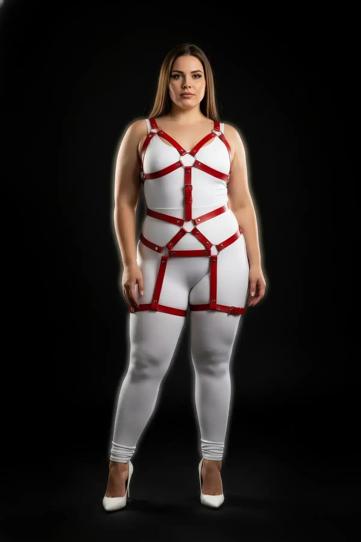 close-up of red faux leather straps and silver zinc alloy O-ring at chest junction with riveted eyelets