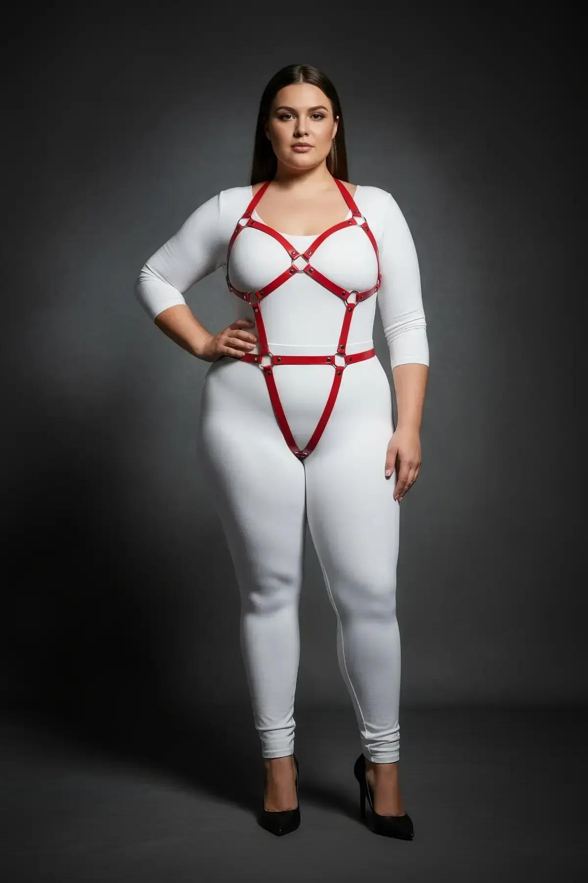 red strappy body harness worn over white bodysuit showing full torso and hip coverage
