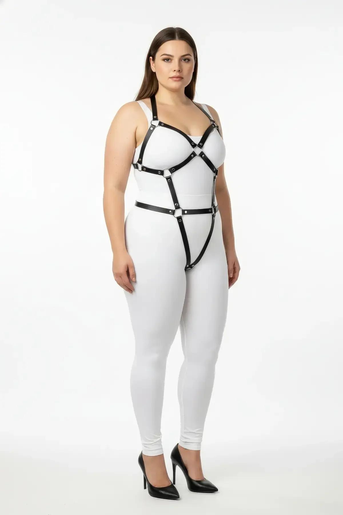Close-up of silver O-ring junction on black PU leather harness straps with metal eyelets