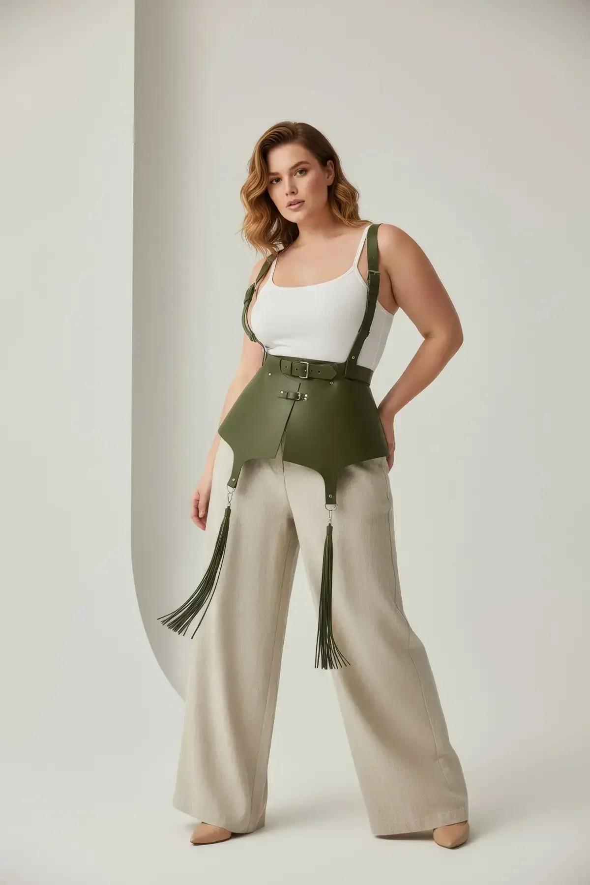olive khaki vegan leather waist harness front panel close-up with silver ring tassel attachment hardware