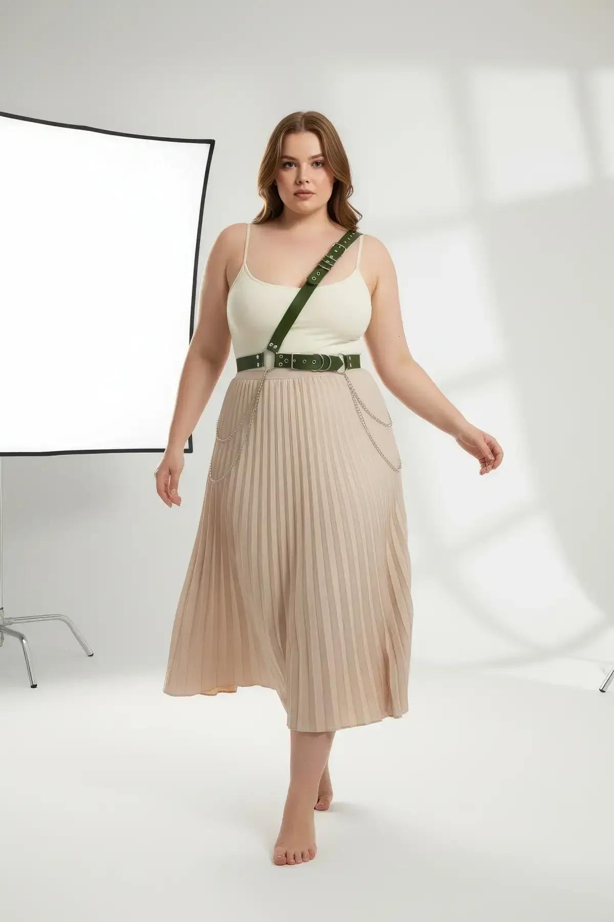 dark green PU leather waist belt with silver eyelet grommets and decorative chain detail close-up