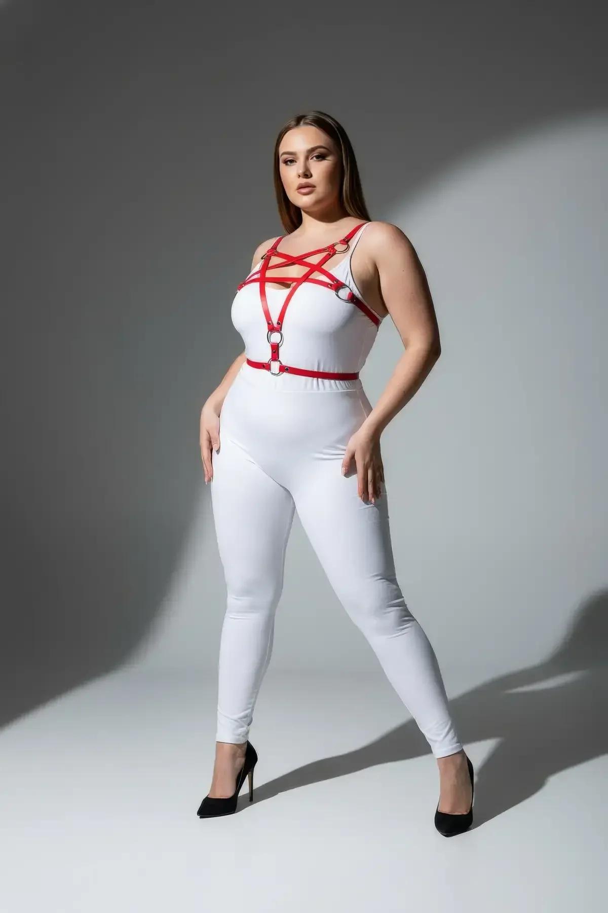 Front view of red five-point geometric chest harness showing adjustable slide buckle closures