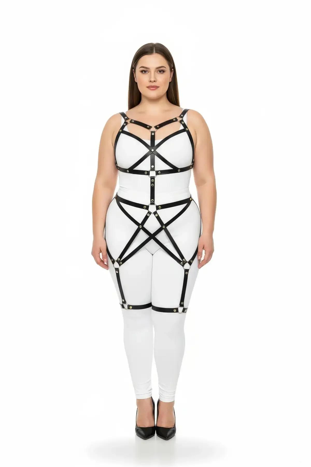 black vegan leather strappy harness chest cage panel with gold press-stud connectors close-up