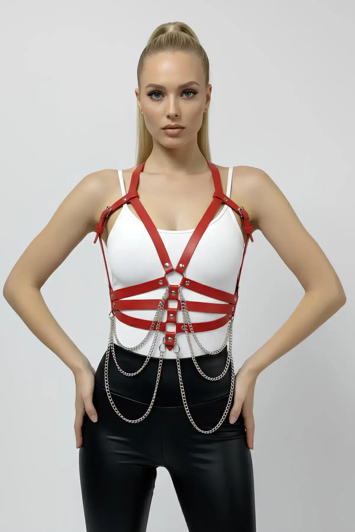 strappy red cage harness lingerie piece showing adjustable strap detail and chain drape