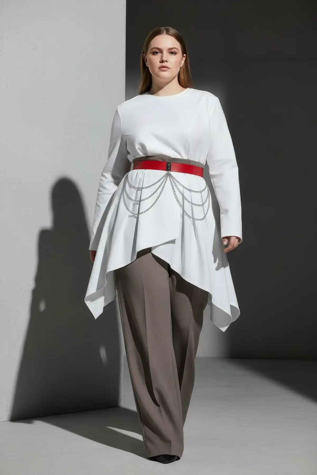 red chain waist belt layered over oversized white top street style outfit