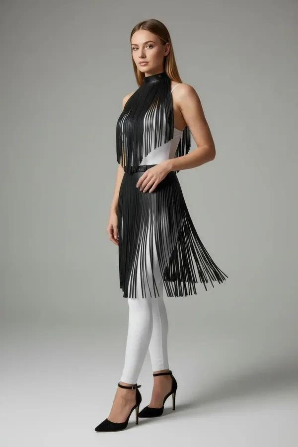 black faux leather fringe mock neck body harness overlay with double-tier cascading fringe strips to mid-thigh