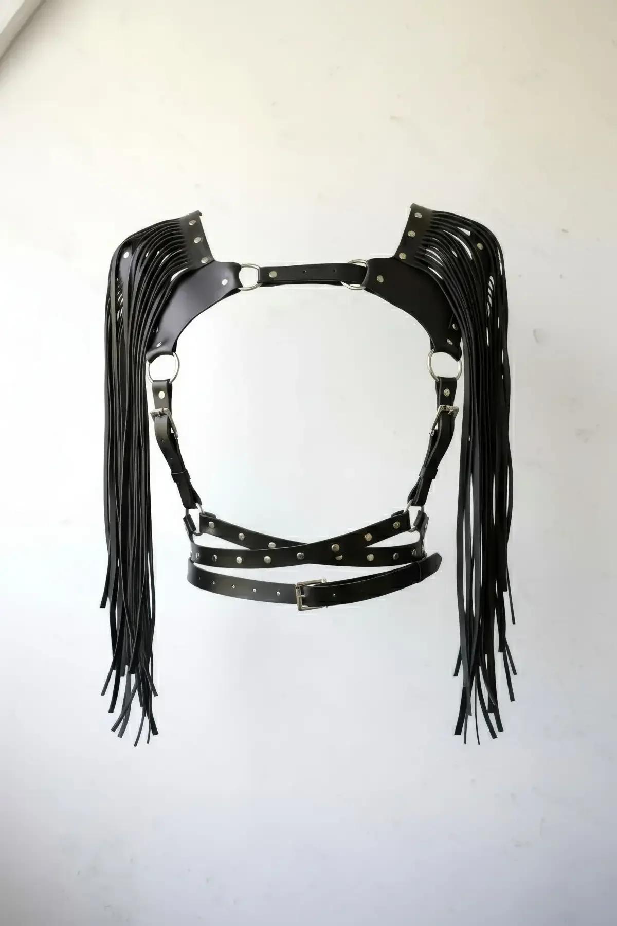 black faux leather chest harness with long shoulder fringe and silver stud accents, criss-cross waist straps
