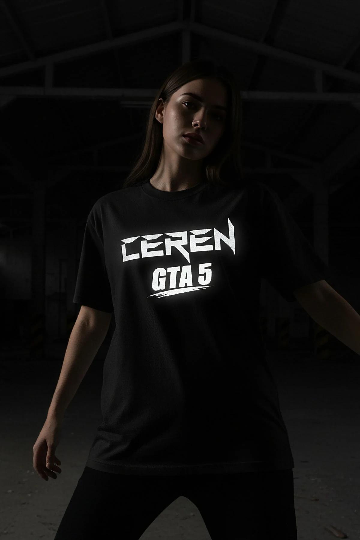 black oversized t-shirt with glow-in-the-dark Ceren GTA 5 angular graphic worn in dark studio setting