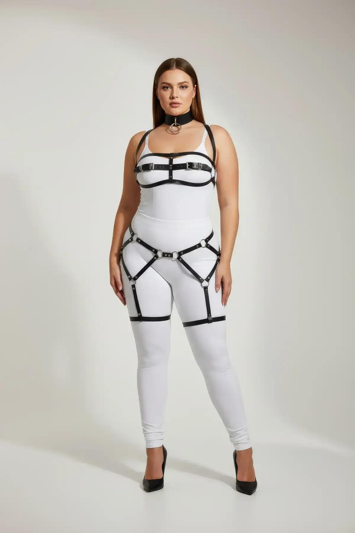 Black faux leather full body harness with silver O-ring choker, chest straps, waist panel, and thigh garter bands on plus-siz