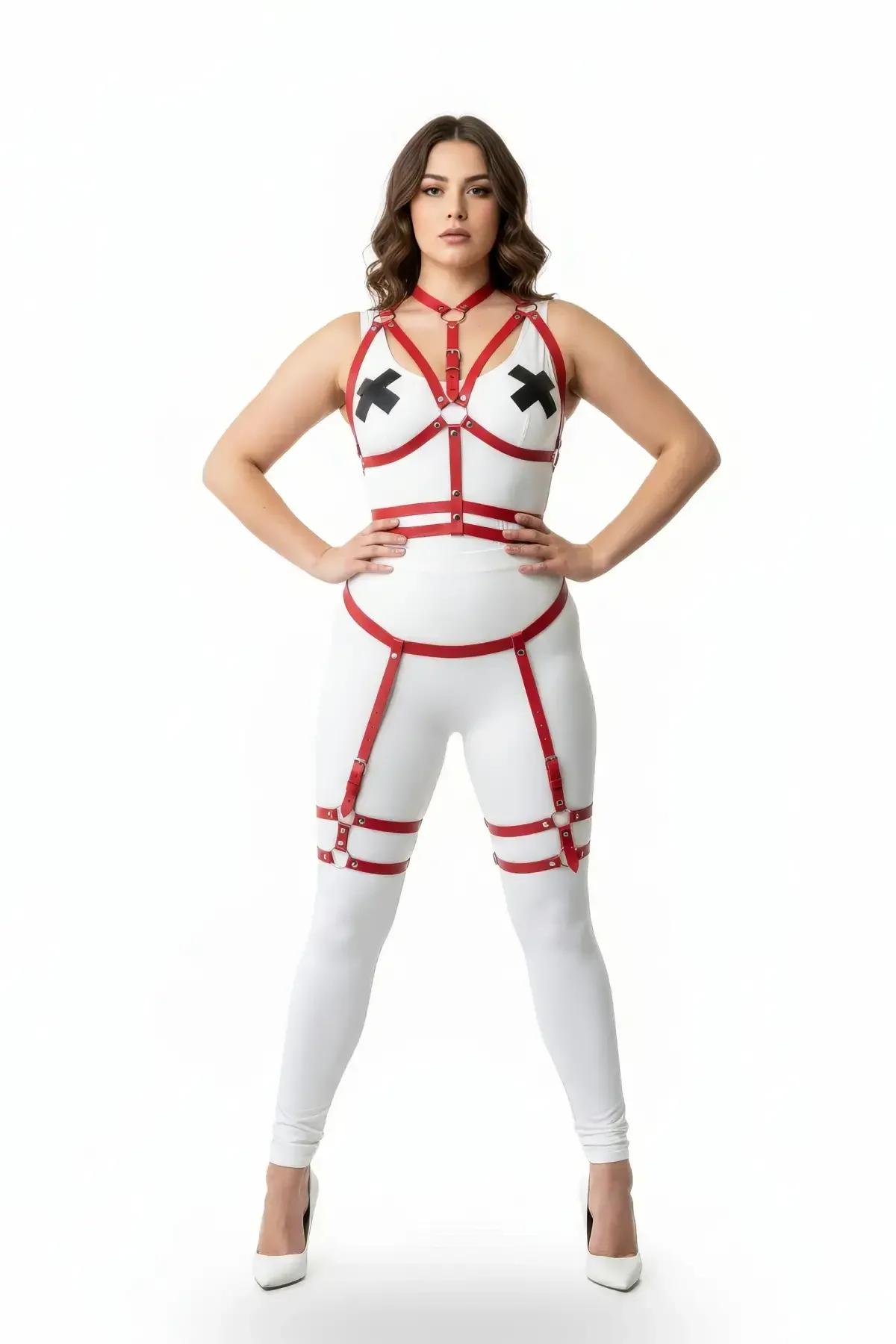red faux leather strappy body harness set with garter thigh straps and gold O-ring buckles, worn by plus-size model