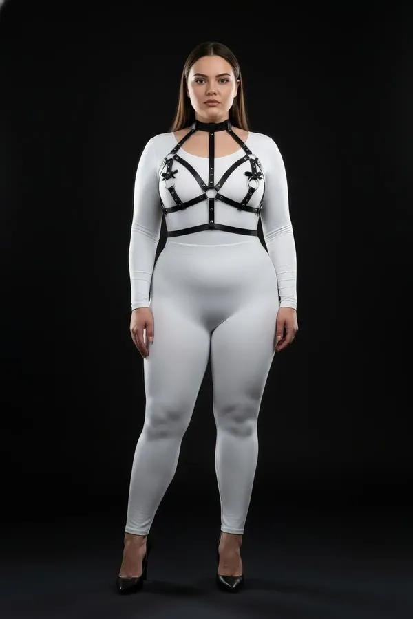 black faux leather strappy chest harness with choker neck collar and silver O-ring center worn over white top