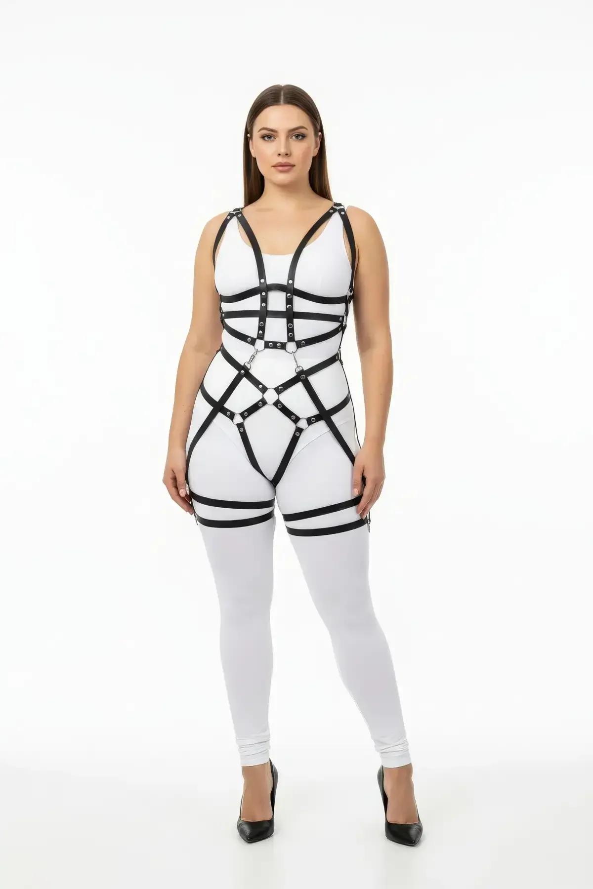 black faux leather full body harness with silver intersecting O-rings, chest cage straps, waist grid, and thigh wrap leg band