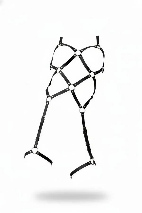 black faux leather caged full body harness with silver O-rings and adjustable thigh garters, flat lay on white background