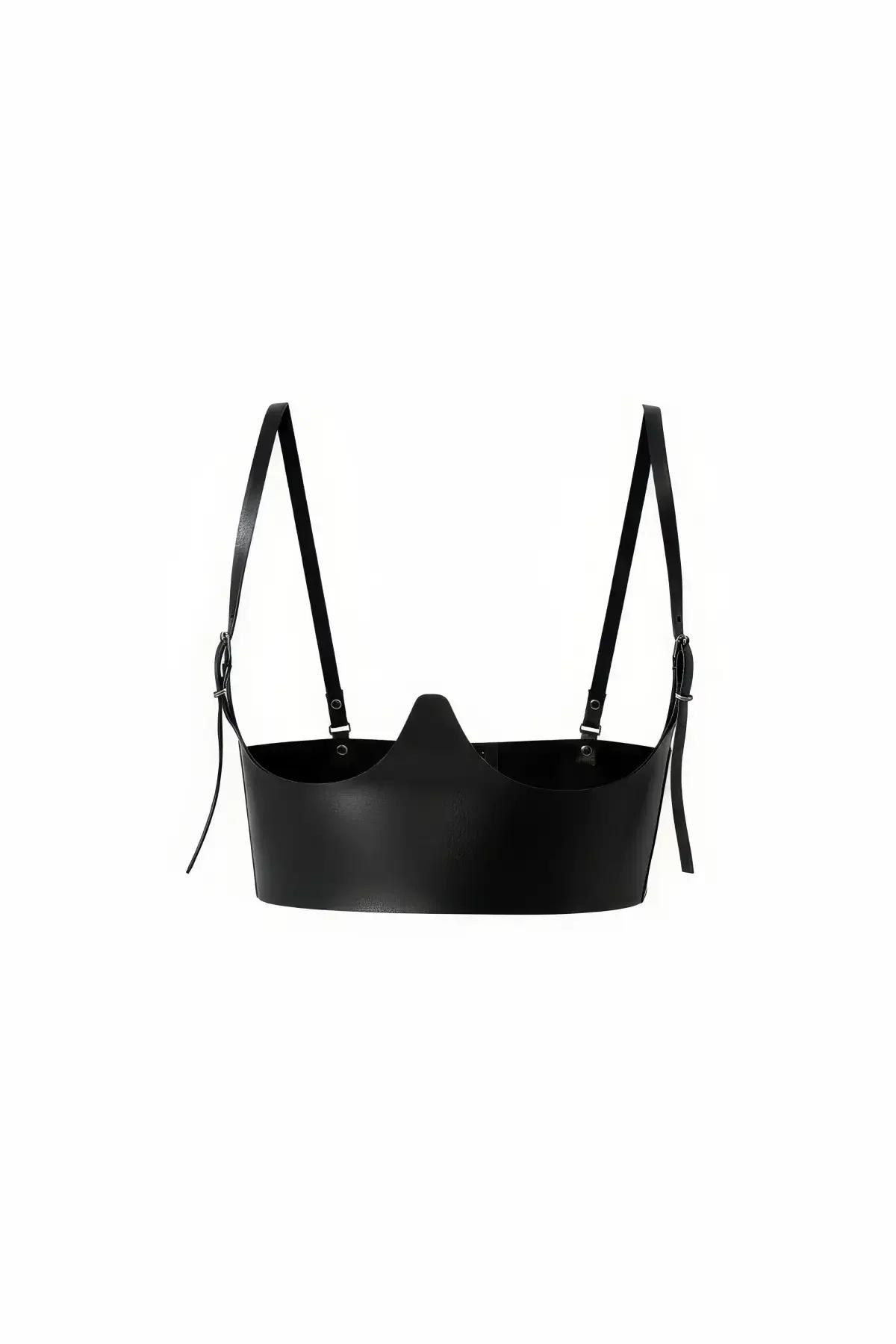 black faux leather underbust harness top with structured V-neckline cutout and adjustable silver-tone shoulder straps