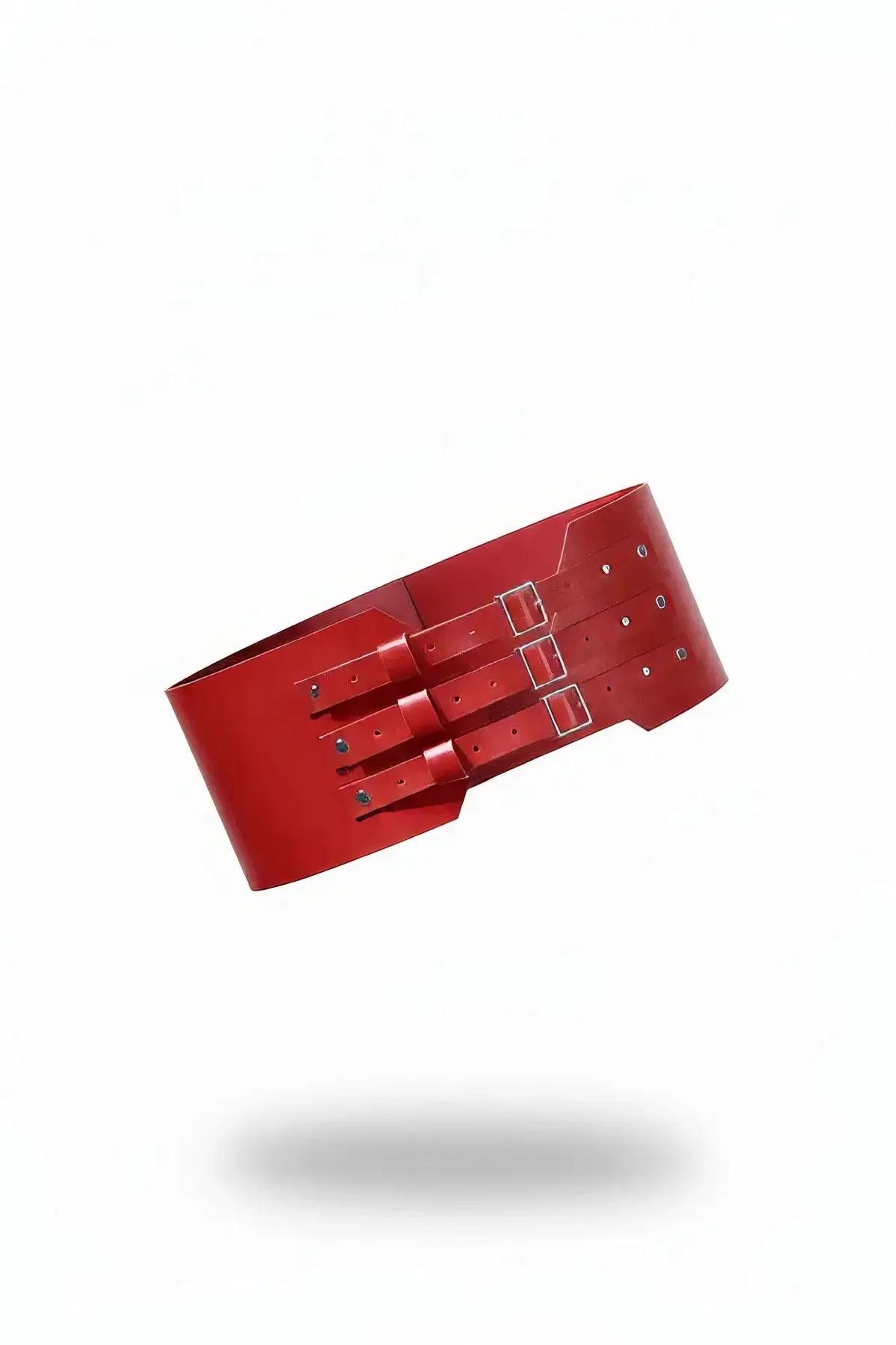 red faux leather corset belt with three silver buckle closures wide structured waist panel