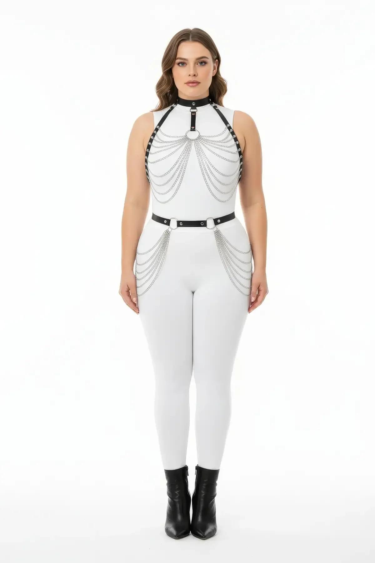 black faux leather harness set with cascading silver chain drape over chest and hip waist belt, plus-size model, full front v