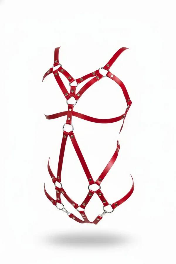 strappy red faux leather body harness with silver O-rings and rivets covering chest torso and hips
