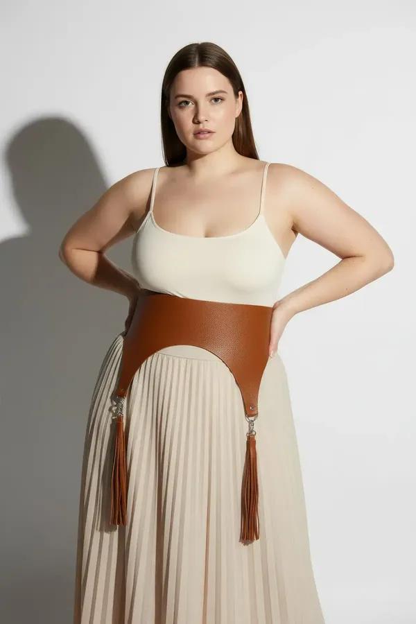 tan faux leather wide waist harness with fringe tassel garter details and silver clip hardware