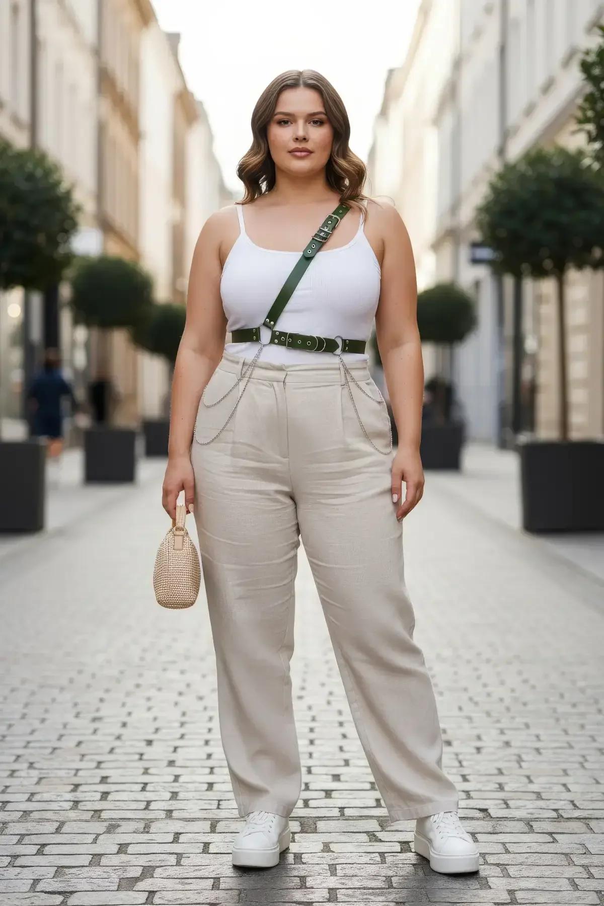 dark green faux leather body harness diagonal chest strap waist belt silver chains worn over white tank